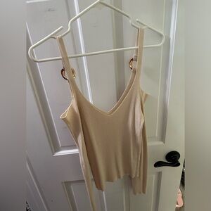 Cream exposed shoulder sweater with metal ring detail on straps